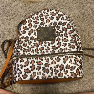 Louis Vuitton patch with leopard print backpack so cute
